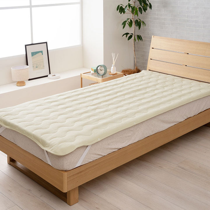 綿のやさしい肌触りとジャガードの素材感がやさしい 敷きパッド