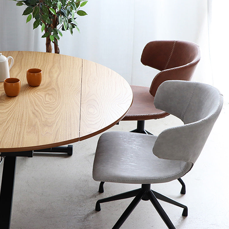 触り心地の良い合成皮革がレトロな雰囲気のラウンドチェア 回転式