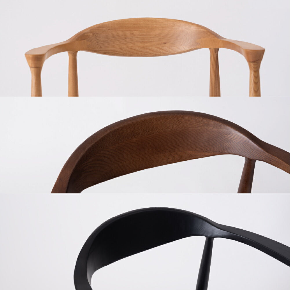 背面とアームが美しいアーチ、丸みを帯びたフォルムが特徴のチェア