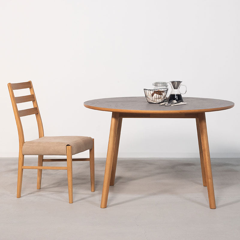 モルタル調の天板にきれいな木目が特徴のスンカイ材を組み合わせ 円形ダイニングテーブル 直径114cm 丸テーブル