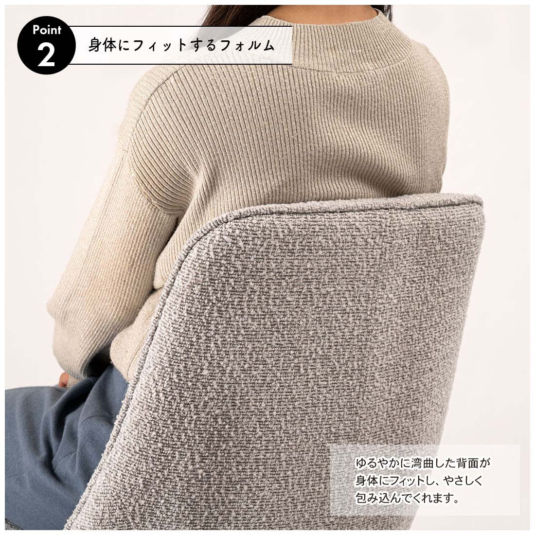 立体的で動きのあるファブリックを使用した回転アームチェア