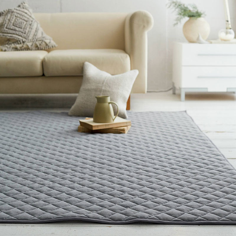 杢糸と無地糸をジャカード編機でヘリンボーンに編み上げたニットファブリックラグ【Fab the Home】