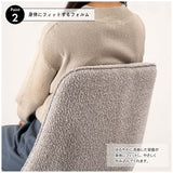 立体的で動きのあるファブリックを使用した回転アームチェア